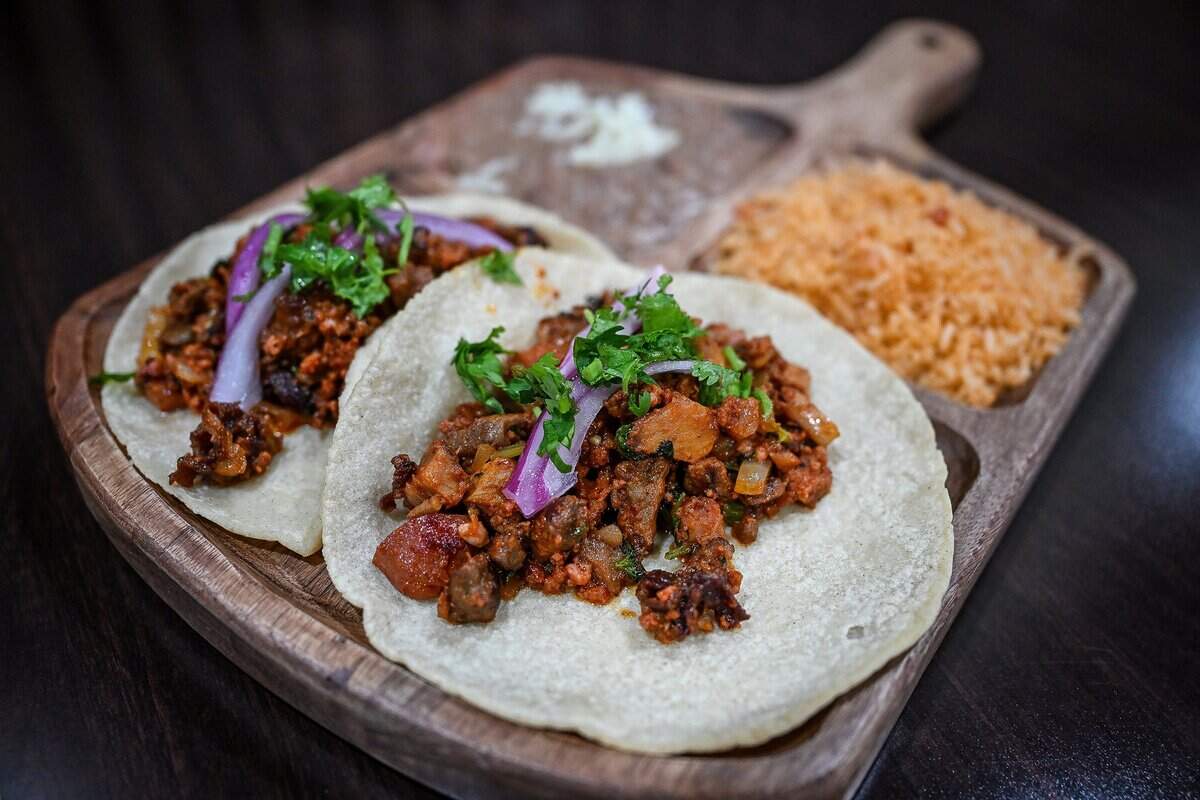 A plate of discada tacos with pork and mixed beef are served up at Masa Madre, a New Mexican restaurant on the northeast corner of Palm and Bullard in Fresno.