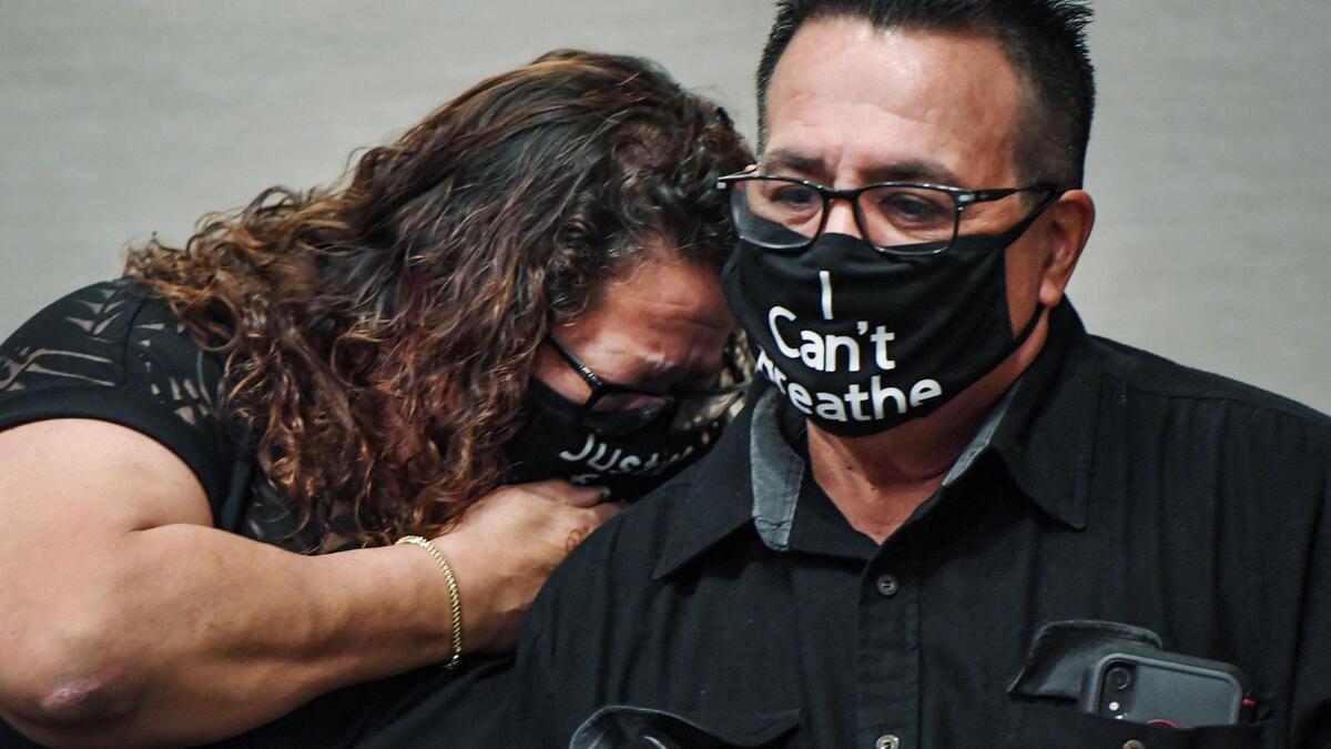 Anthony and Cecilia Perez become emotional while watching May 2017 police body camera video capturing officers using a backboard to restrain their son Joseph Perez before he died.