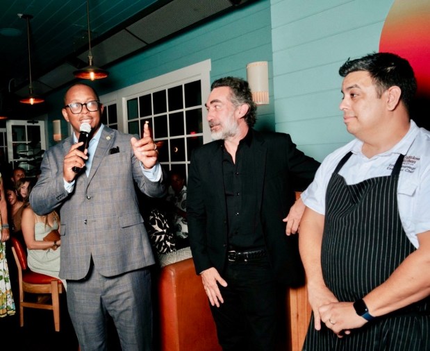 Mayor Rex Richardson, left, speaks during the reopening celebration for Bungalow Kitchen, in the 2nd & PCH shopping center, on Sept. 24. Next to him are Bungalow Kitchen owner Brent Bolthouse, middle, and chef Eric Samaniego. (Photo by Jo Murray, Grunion Gazette/SCNG)