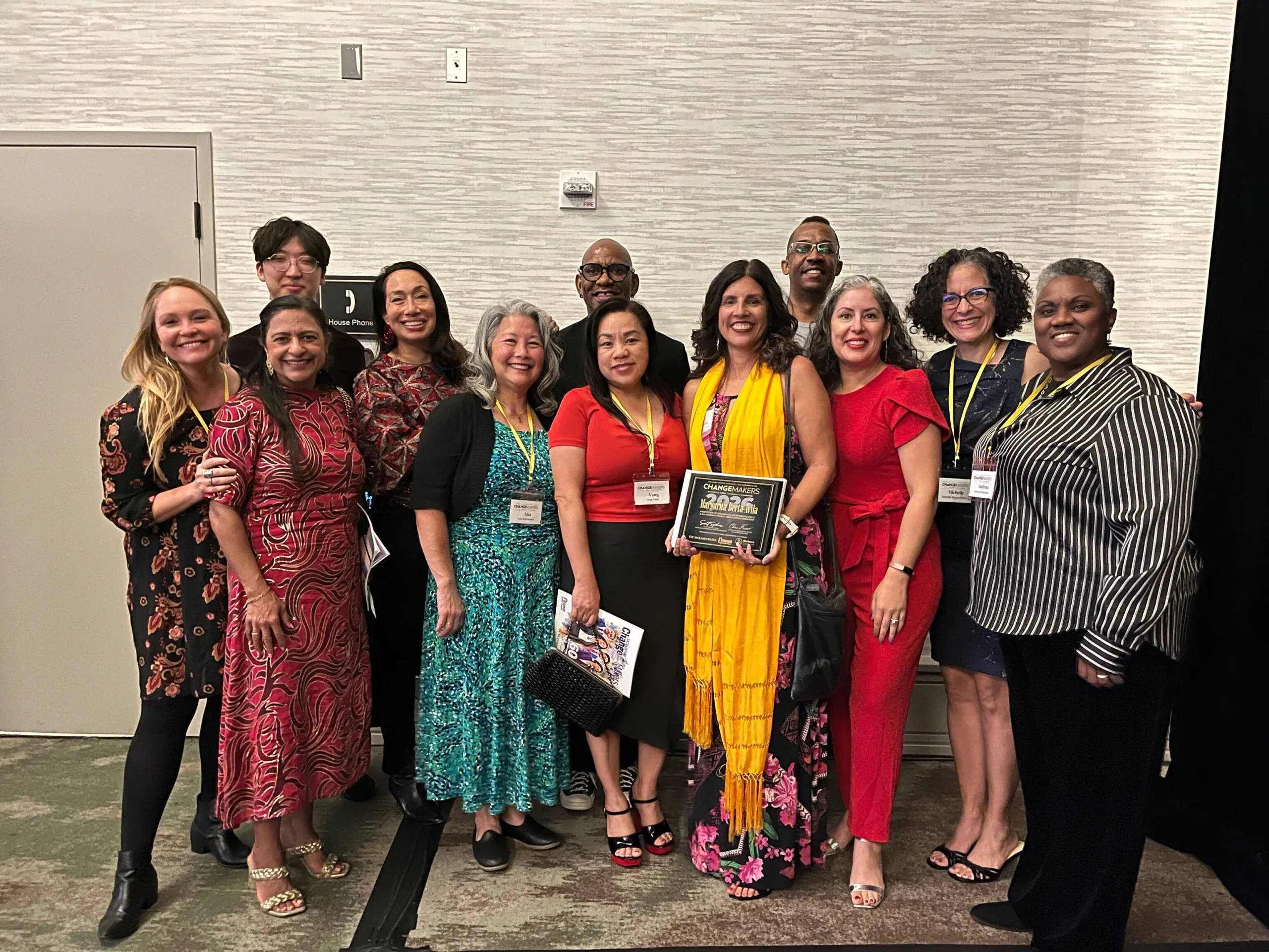 A group of CFA member and staff stand together.