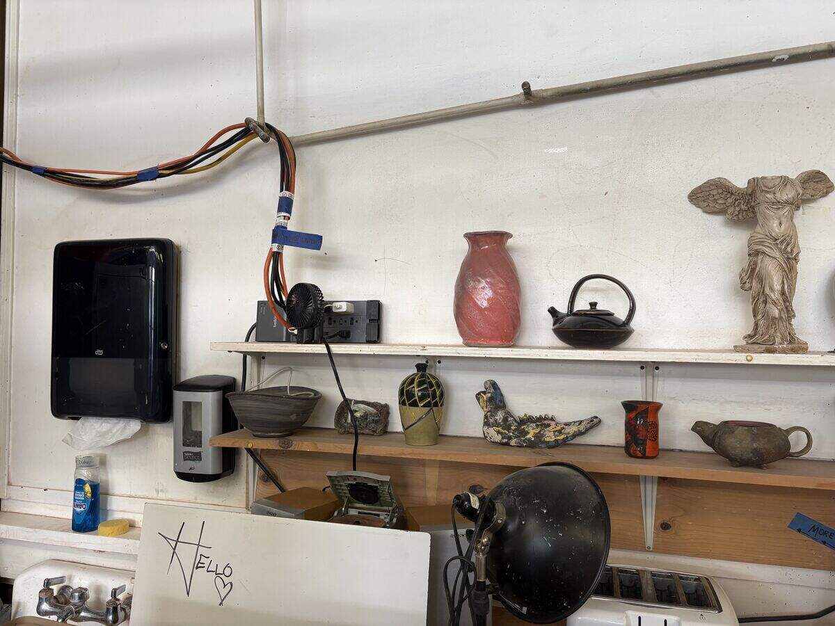 In the ceramics studio in Kadema Hall, multiple devices across studios are powered through a single electrical outlet via extension cords, Oct. 1, 2026.