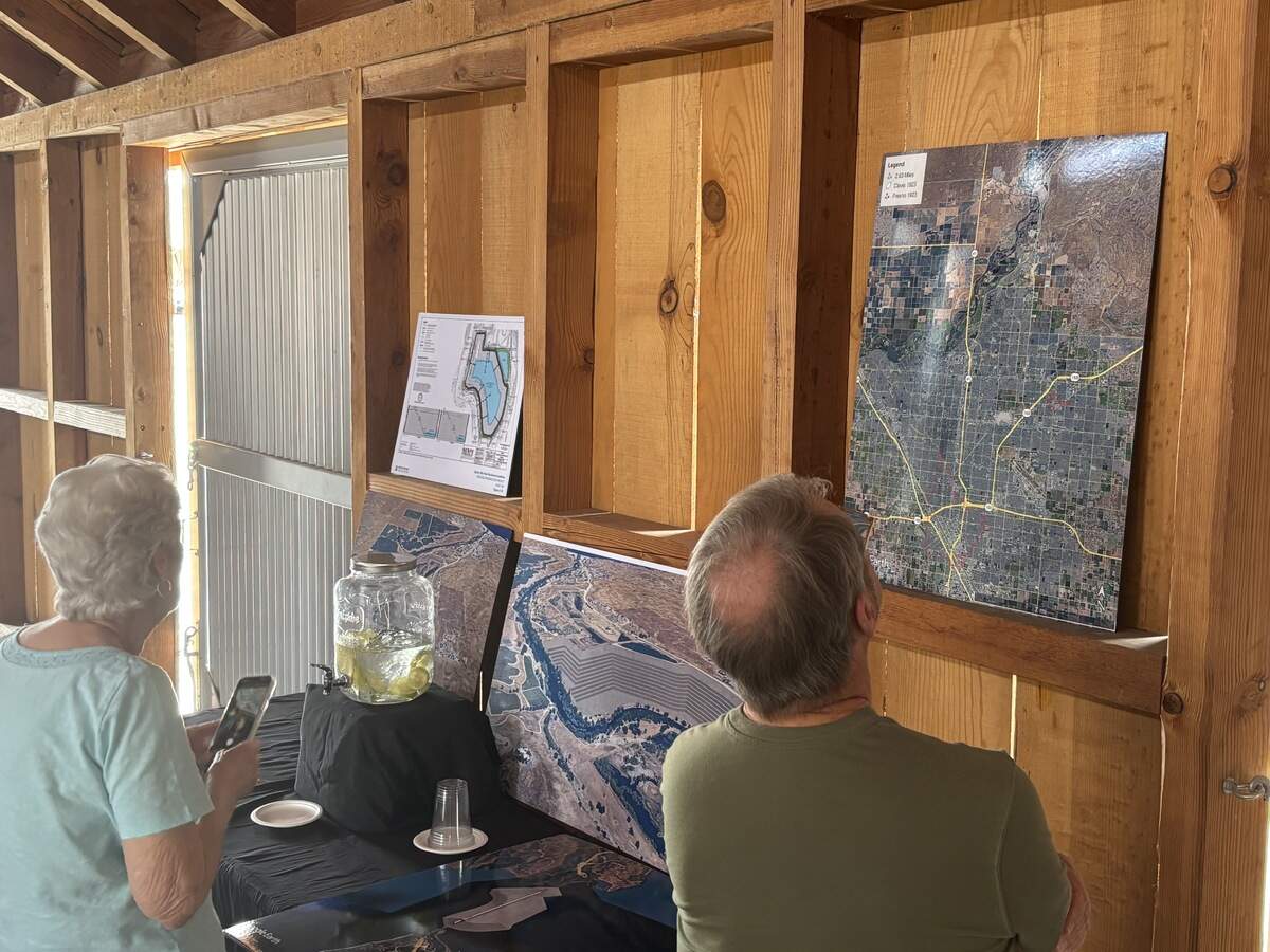 Concerned residents review photo composite renderings of CEMEX’s proposed blast mine and its proposed location near the San Joaquin River. The photos were on display Friday, Oct. 2, 2026, at the San Joaquin River Parkway and Conservation Trust’s River Center.