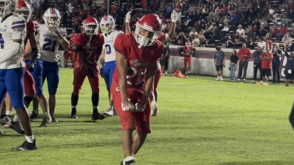 Sanger’s Miguel Salazar scores a touchdown against Buchanan on Thursday, Sept. 17, 2026.