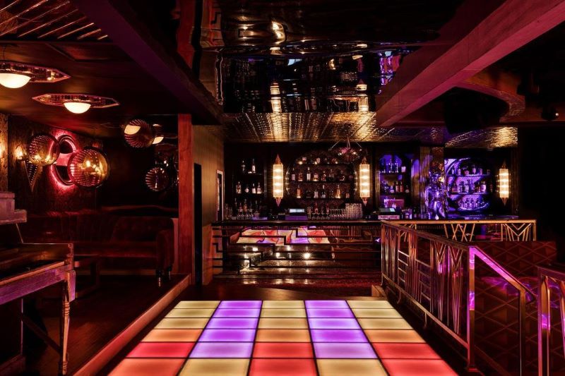 Light-up dance floor and bar at Kiss Kiss Bang Bang.