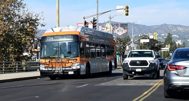 A Metro bus traveling south on Vermont Avenue crosses over the 101 Freeway on Monday. Dec. 2, 2024. Metro will spend about $425 million to improve a central corridor for buses along Vermont Avenue in L.A. The Vermont Transit Corridor is a proposed 12.4-mile special bus lanes project from Sunset Boulevard to 120th Street in L.A. (Photo by Dean Musgrove, Los Angeles Daily News/SCNG)
