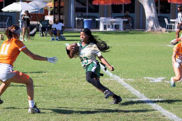 Long Beach Poly's Amaia Johnson rushes against St. Joseph in flag football action at St. Joseph High School in Lakewood on Wednesday, Sept. 2, 2026. (Photo by Howard Freshman, Contributing Photographer)