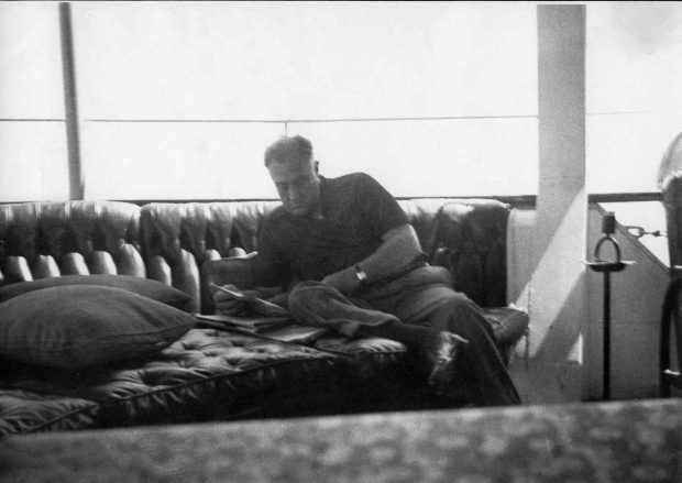 Then-President Franklin D. Roosevelt relaxes on the custom fantail settee he helped design on the USS Potomac, now permanently docked in Oakland. (Courtesy of the USS Potomac Association)
