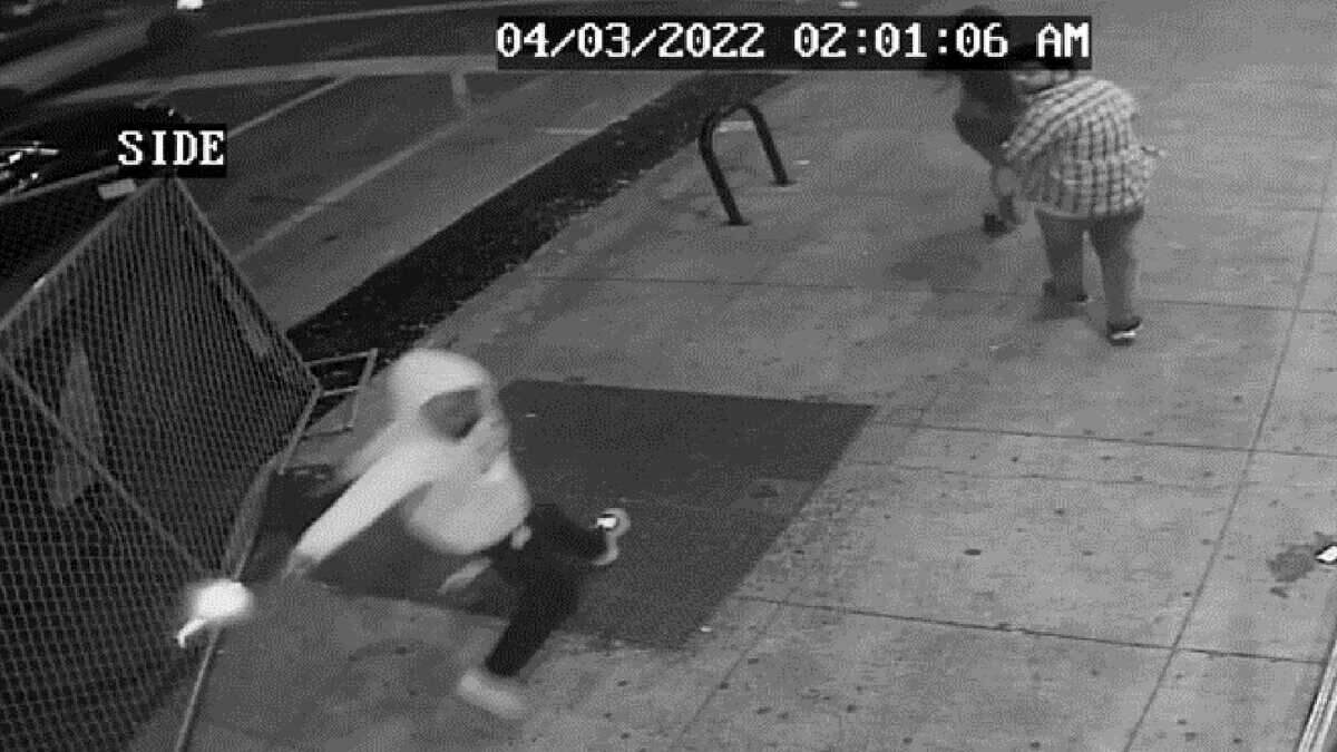 A surveillance video obtained by the Sacramento Police Department shows Mtula Payton firing his weapon as he flees on 10th Street after a gun battle at 10th and K streets April 3, 2022, in downtown Sacramento.