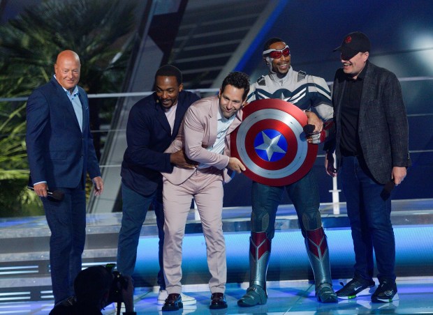 Bob Chapek, Chief Executive Officer of The Walt Disney Company, left, Anthony Mackie, Paul Rudd, a Disney cast member playing Captain America, and Kevin Feige, president of Marvel Studios, right, during the opening ceremony for Avengers Campus inside Disney California Adventure in Anaheim, CA, on Wednesday, June 2, 2021. (Photo by Jeff Gritchen, Orange County Register/SCNG)