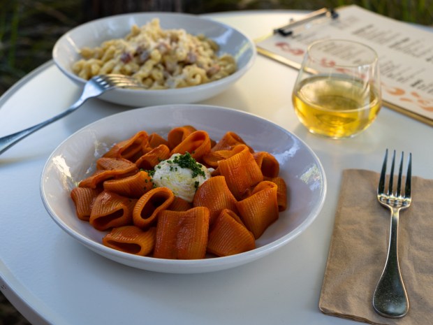 In the foreground is Bloom's most popular pasta dish, the rigatoni. In the back ground is its carbonara with house-made gemelli. (Photo courtesy of Bloom)