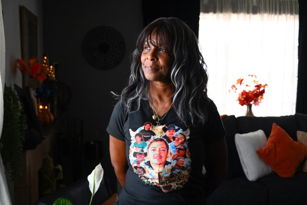 Tracey Clavel wears a shirt with a picture of her late husband in her home in Anaheim on Friday, October 16, 2026. Daniel Clavel, 61, died of West Nile virus on Sept. 16. They were married for 38 years. (Photo by Jeff Gritchen, Orange County Register/SCNG)