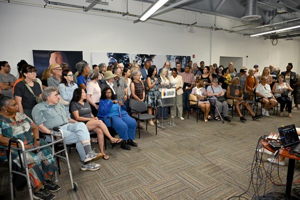 Survivors of the Eaton and Palisades fires gathered for a press conference and then wrote post cards to Governor Gavin Newsom objecting to a bailout of utilities on July 24, 2026 in Pasadena, CA. (Photo by John McCoy, Contributing Photographer)