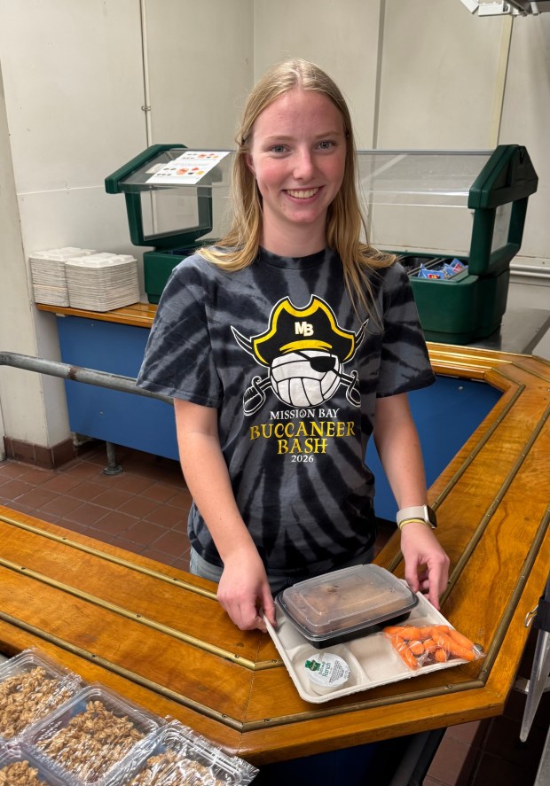Mission Bay High junior Zara Hedley selected the chicken entree. Also offered were fresh fish tacos and fresh pork carnitas burritos. (Cyril A Reinicke)