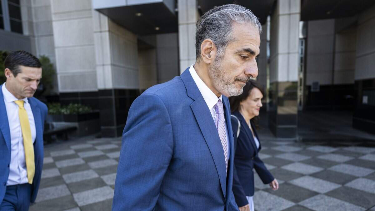 Former Sacramento City Council member Sean Loloee, center, leaves the Robert T. Matsui United States Courthouse in Sacramento on Thursday, April 23, 2026, after he pleaded guilty to fraud and underreported taxes at his Viva Supermarket stores. A trial for Karla Montoya, his co-defendant, started Sept. 30, 2026.