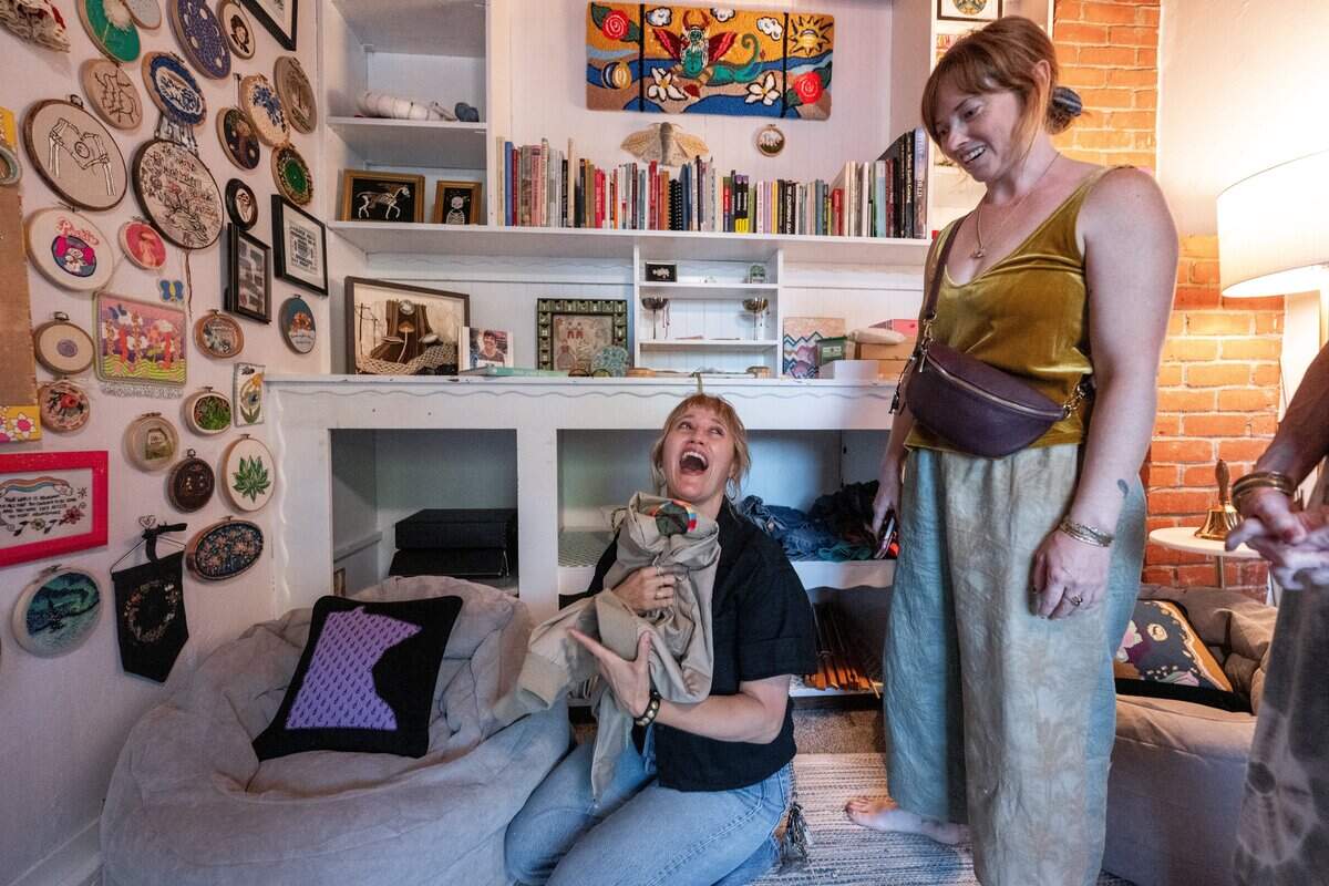 Visitors checks out some of Corinna’s private collection in her private home museum in Sacramento in September.
