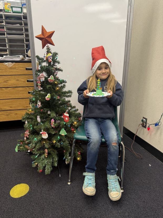 Aurora Williams, 8, at her school last Christmas. (Photo courtesy of Gabrielle Hanson)
