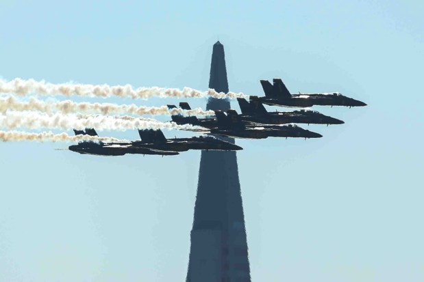 The U.S. Navy Blue Angels fly past the Transamerica Pyramid and the San Francisco Bay during a practice flight for San Francisco Fleet Week, as seen from Treasure Island in San Francisco, Calif., on Thursday, Oct. 8, 2026. (Ray Chavez/Bay Area News Group)
