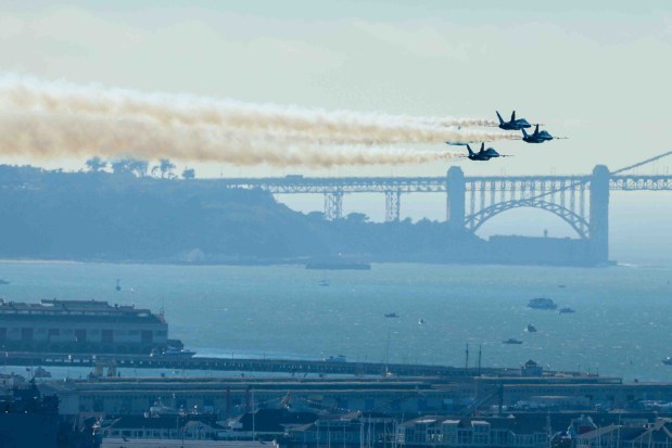 The U.S. Navy Blue Angels fly over the San Francisco Bay during a practice flight for San Francisco Fleet Week, as seen from Treasure Island in San Francisco, Calif., on Thursday, Oct. 8, 2026. (Ray Chavez/Bay Area News Group)