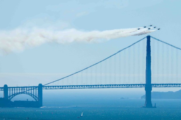 The U.S. Air Force Thunderbirds fly over the Golden Gate and the San Francisco Bay during a practice flight for San Francisco Fleet Week, as seen from Treasure Island in San Francisco, Calif., on Thursday, Oct. 8, 2026. (Ray Chavez/Bay Area News Group)