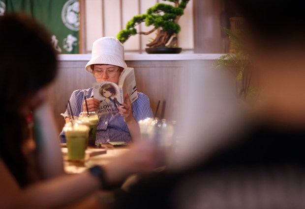 Members of the San Jose Silent Book Club take part in a reading session at a cafe on Sunday, July 26, 2026, in Campbell, Calif. (Aric Crabb/Bay Area News Group)