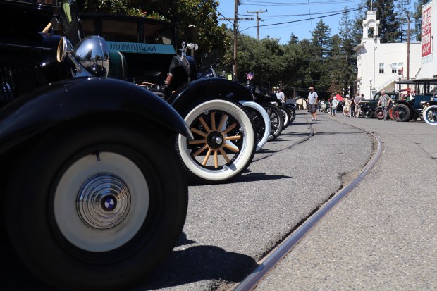 Elegant wheels stretch down the block in a line at the 26th annual Cars in the Park at History Park in San Jose, Calif., on Saturday, September 12, 2026. (Kaitan Pawar/Mosaic)