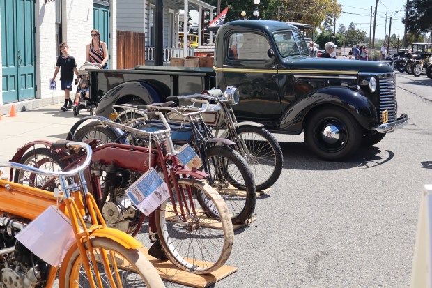 Bicycles lean together as one in front of a vintage pickup truck at the 26th annual Cars in the Park at History Park in San Jose, Calif., on Saturday, September 12, 2026. (Kaitan Pawar/Mosaic)