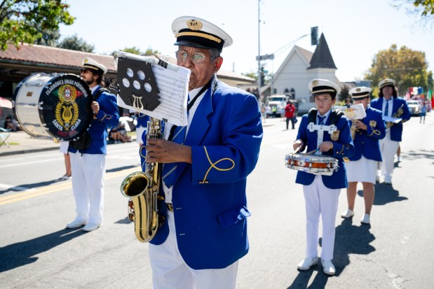 A saxophonist from Sociedade Filarmónica União Portuguesa de Santa Clara performs during the 57th Santa Clara Parade of Champions in Santa Clara, Calif., on Saturday, Oct. 3, 2026. (Thien-An Truong for Bay Area News Group)