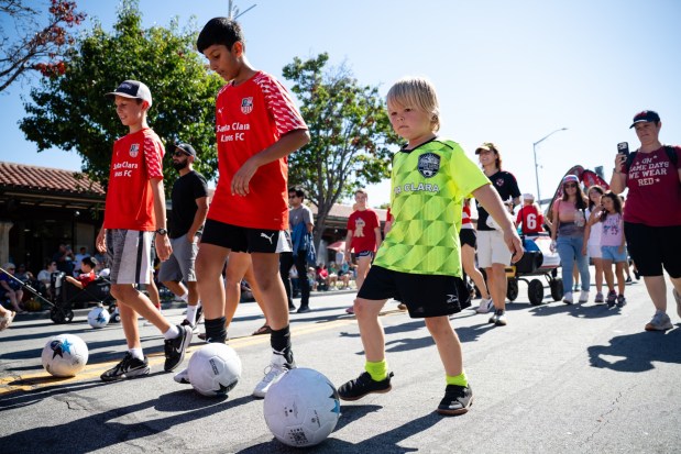 Santa Clara Lions FC players dribble soccer balls during the 57th Santa Clara Parade of Champions in Santa Clara, Calif., on Saturday, Oct. 3, 2026. (Thien-An Truong for Bay Area News Group)