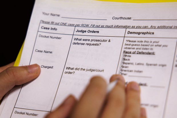 Evergreen Valley High School student Ariana Corbu, 17, fills out a note-taking template while observing a court proceeding at the Hall of Justice in San Jose, Calif., on Aug. 28, 2026. She is one of the co-founders of the student-led court watching group Justice for All. (Dai Sugano/Bay Area News Group)