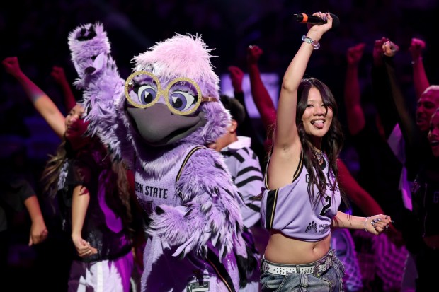 Golden State Valkyries macost, Violet, dances along with Oscar- and Grammy-winning artist Rei Ami, of "K-Pop Demon Hunters," during the halftime performance of Game 2 of the WNBA semifinals between the Golden State Valkyries and the Las Vegas Aces at Chase Center in San Francisco on Wednesday, Oct. 7, 2026. (Ray Chavez/Bay Area News Group)