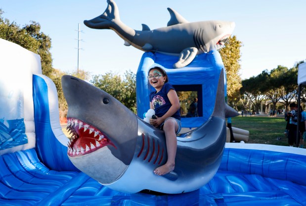 Rexy, 8, from San Jose, rides a shark ride during opening day festivities at the SAP Center in San Jose, Calif., on Thursday, Oct. 1, 2026. (Nhat V. Meyer/Bay Area News Group)
