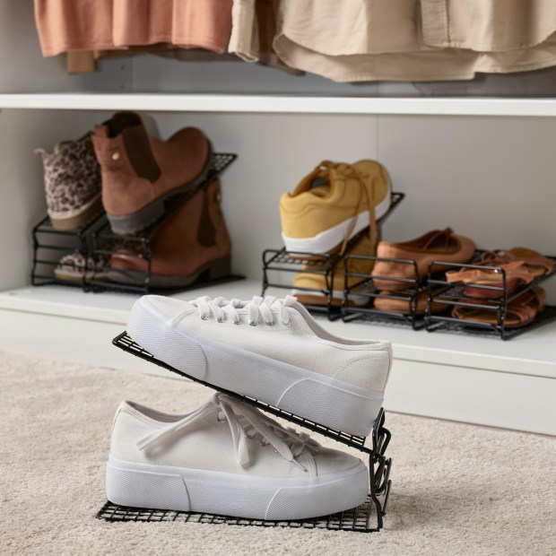 One space-saving option for stackable shoe storage is Ikea's Skostall's Shoe Organizer, which places one atop the mate. The incline of the top shelf is easy to adjust to accommodate varied shoe heights. (Ikea)
