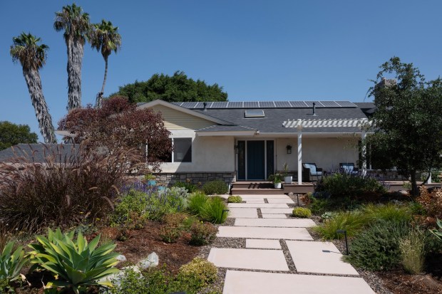 Mark Linman used 3D modeling software to create a replica of their house and predict sunlight and shadows in areas around the structure. (Luke Johnson / The San Diego Union-Tribune)