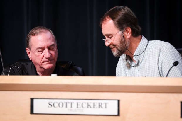 Trustees Jim Kelly and Scott Eckert chat before a Grossmont Union High School Board meeting at Grossmont High School on Thursday, July 17, 2025 in El Cajon. (Meg McLaughlin / The San Diego Union-Tribune)
