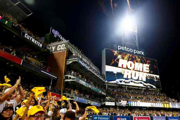 San Diego Padres fans celebrate after Gavin Sheets' home run during Wednesday's win over the Chicago Cubs in Game 2 of the National League Wild Card Series at Petco Park on Wednesday, Sept. 30, 2026 in San Diego, California. (Meg McLaughlin / The San Diego Union-Tribune)
