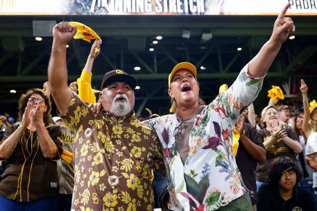 San Diego Padres fans cheer during Game 2 of the National League Wild Card Series against the Chicago Cubs at Petco Park on Wednesday, Sept. 30. (Meg McLaughlin / The San Diego Union-Tribune)