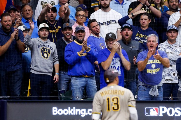Milwaukee Brewers fans heckle Manny Machado #13 of the San Diego Padres after he struck out during the ninth inning of Game 1 of the National League Division Series at American Family Field on Saturday, Oct. 3, 2026 in Milwaukee, California. (Meg McLaughlin / The San Diego Union-Tribune)