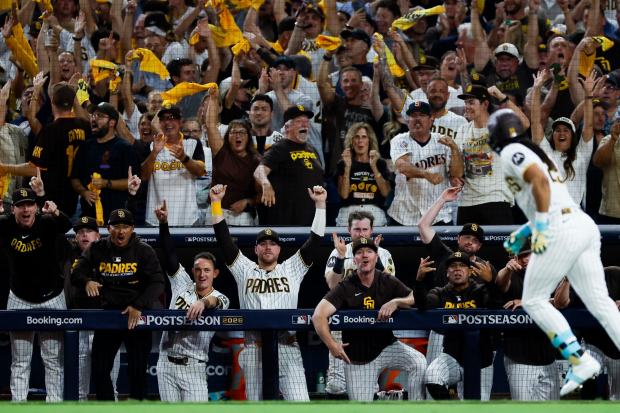 Fernando Tatis Jr. and teammates celebrate after his home run against the Milwaukee Brewers during the third inning in Game 4 of the National League Division Series at Petco Park on Wednesday, Oct. 7, 2026 in San Diego, California. (Meg McLaughlin / The San Diego Union-Tribune)