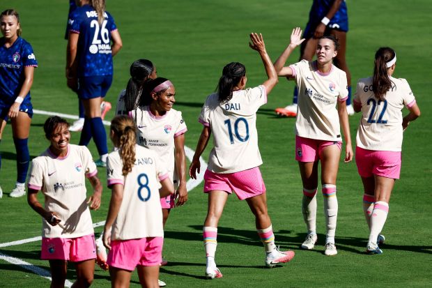 Kenza Dali (10) and Brooklyn Courtnall (6) of the San Diego Wave FC and teammates celebrate after a goal against the North Carolina Courage at Snapdragon Stadium on Saturday, Sept. 12, 2026 in San Diego, California. (Meg McLaughlin / The San Diego Union-Tribune)