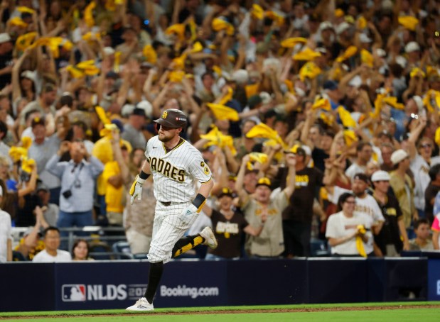 Jake Cronenworth of the San Diego Padres rounds the bases after hitting a solo home run in the fifth inning against the Milwaukee Brewers during Game 3 of the National League Division Series at Petco Park on October 6, 2026 in San Diego, CA. (K.C. Alfred / The San Diego Union-Tribune)