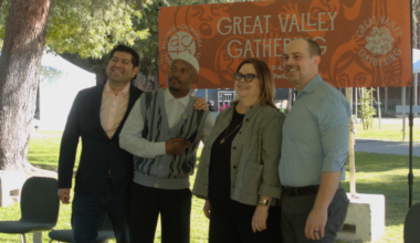 Speakers (left to right, District 3 Supervisor Luis Chavez, rap artist Fashawn, Festival Director Amy Kitchener, CEO of Downtown Fresno Partnership Elliott Balch) for the Great Valley Gathering Press Conference pose for a picture at Courthouse Park on Sept. 30.