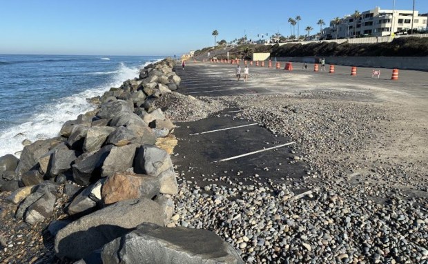 The state Parks Department has hired a consulting engineers to plan repairs for the erosion damage at the Tamarack Avenue beach parking lot in Carlsbad.
