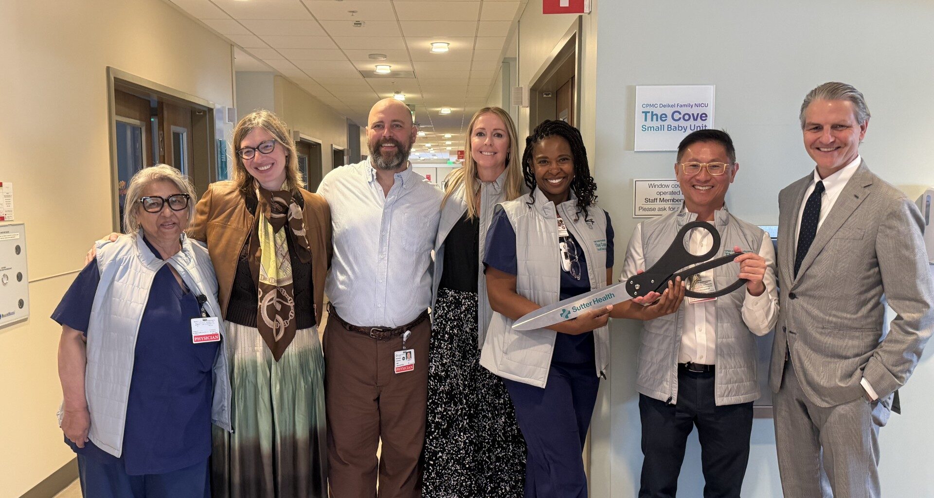 Group at a ribbon cutting in a hospital