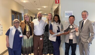 Group at a ribbon cutting in a hospital