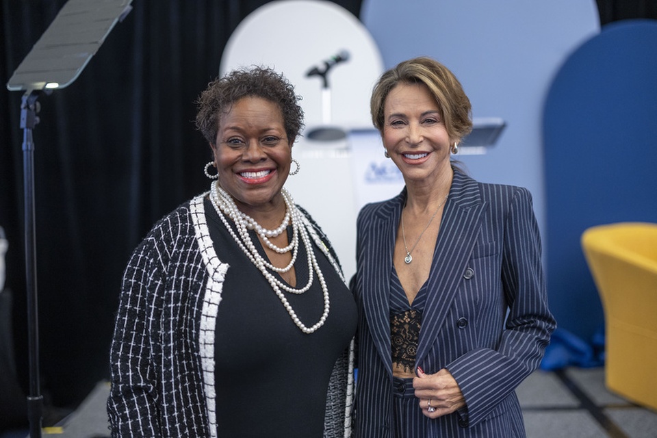 Two attendees smile together during an ACE event at Cal State LA.