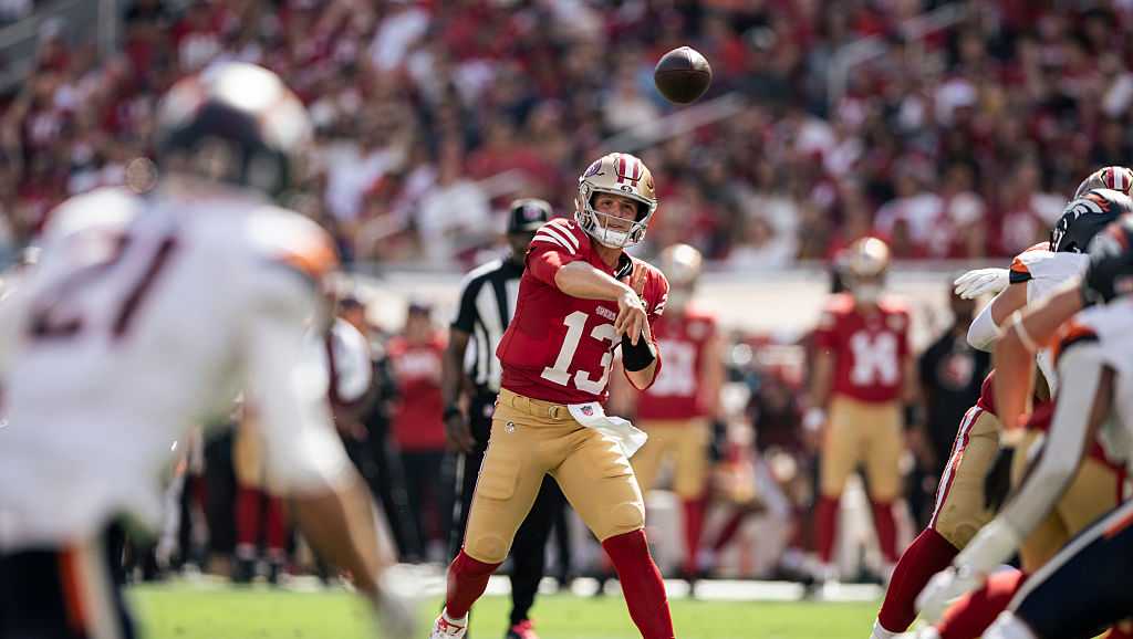 Brock Purdy throws 2 TD passes to lead the undefeated 49ers past the Broncos 24-14