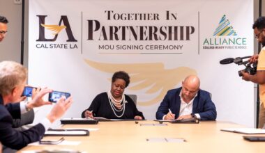 Cal State LA and Alliance College-Ready Public Schools representatives sign a memorandum of understanding during a partnership ceremony.