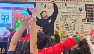 a person leading a dancing exercise with children