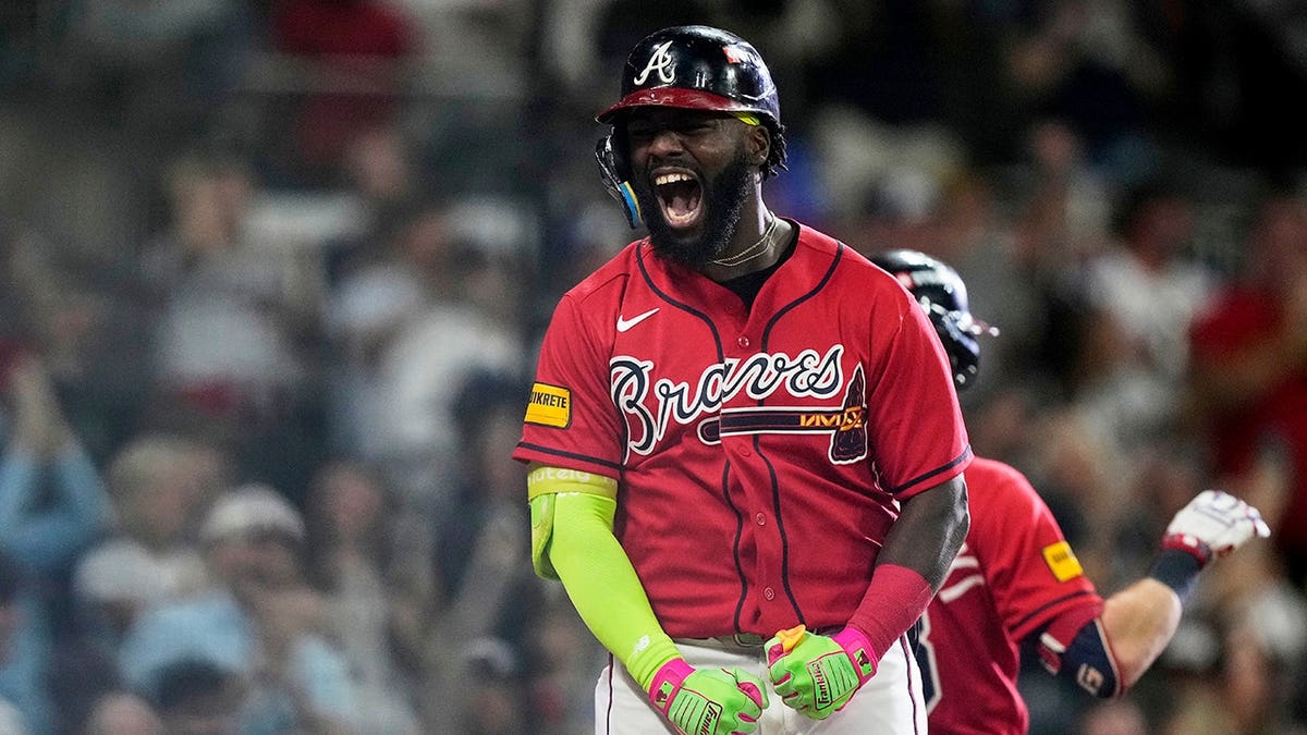 Michael Harris II celebrates after hitting a three-run home run for the Atlanta Braves.