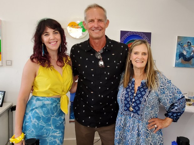 Artist Sarah Stieber, Point Loma Association board chair Jeff Bolster and past chair Beth Roach at the unveiling of Stieber's mural. (Ashley Mackin-Solomon)